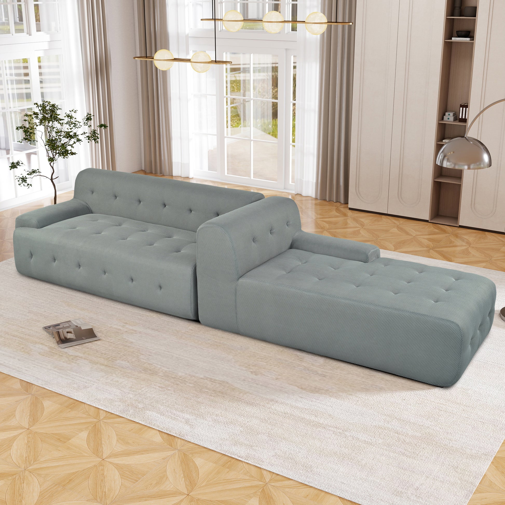 Modern sectional sofa in light grey textured fabric featuring tufted cushions for elegant living spaces