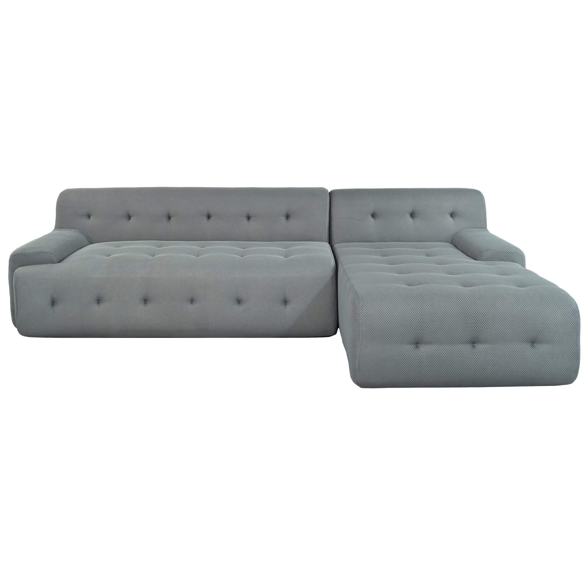Grey tufted sectional sofa with textured fabric and minimalist design