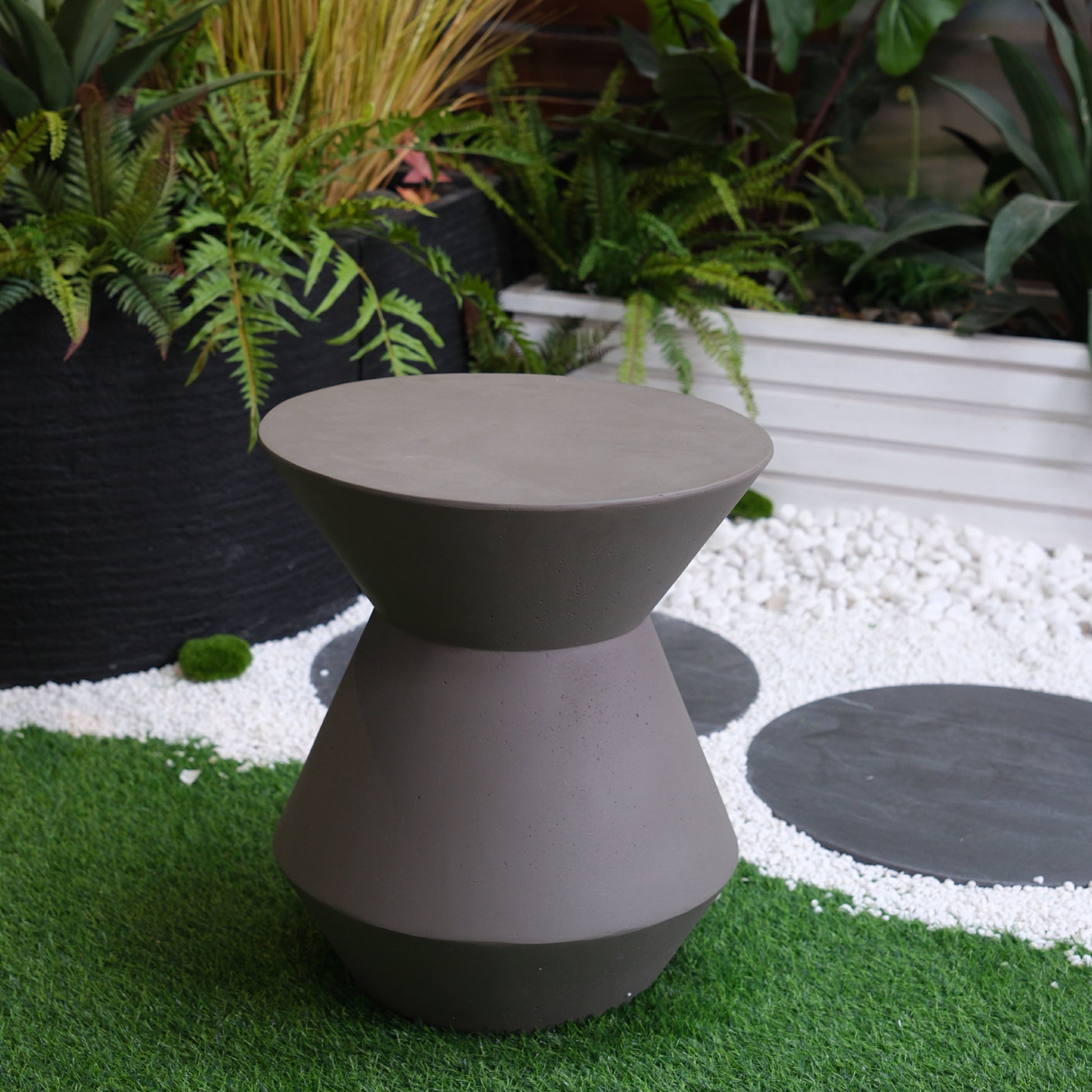 Modern taupe concrete hourglass garden stool perfect accent for outdoor seating