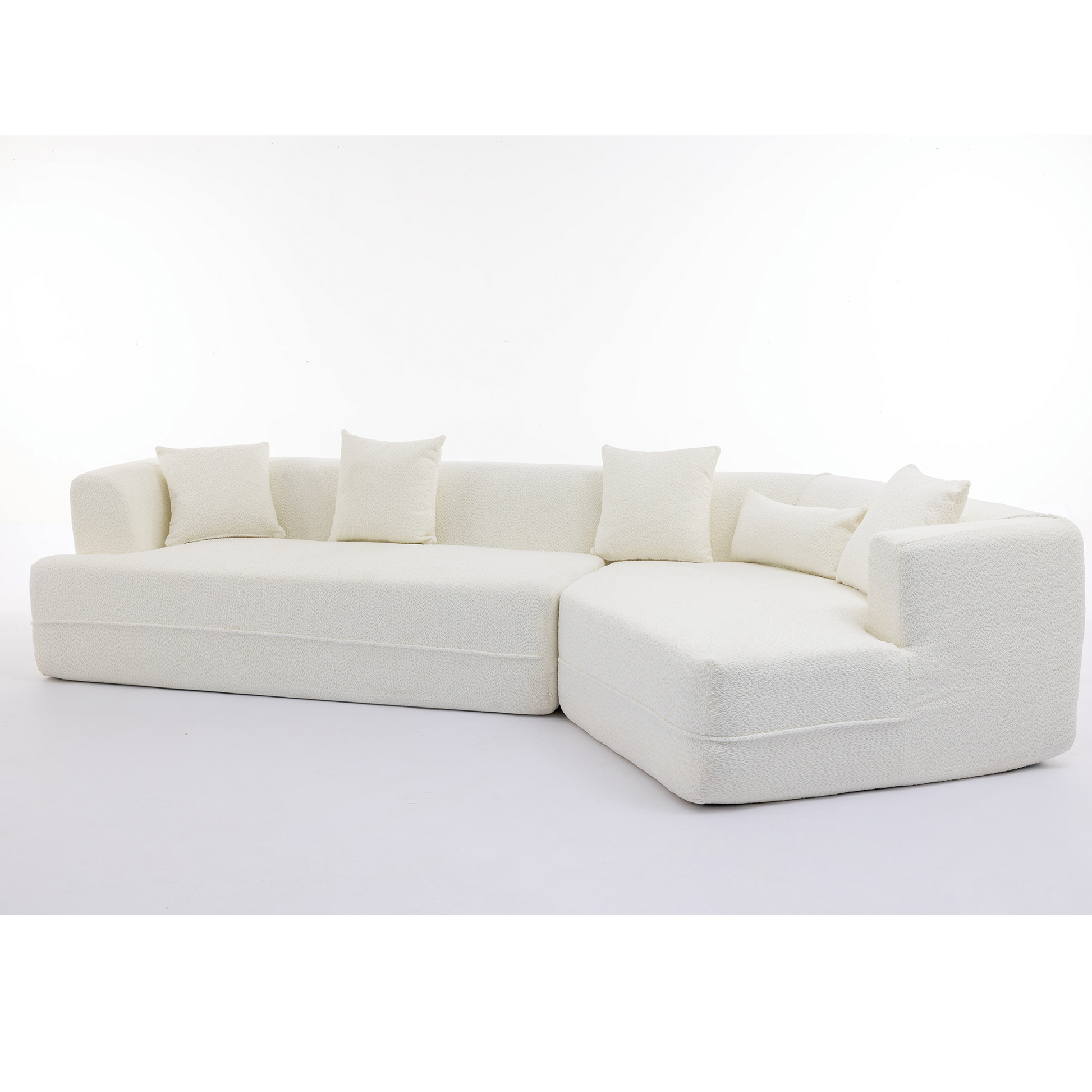 Cream boucle fabric sectional sofa with rounded arms and plush cushions perfect for modern living rooms