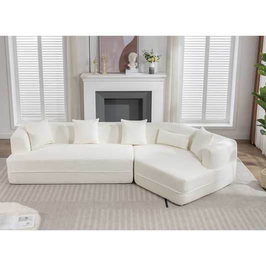 Plush white sectional sofa with textured fabric and matching throw pillows perfect for modern living rooms