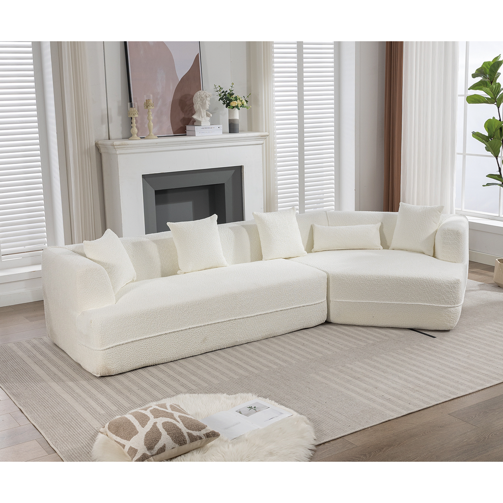Plush ivory sectional sofa with textured fabric and loose cushions perfect for modern living rooms
