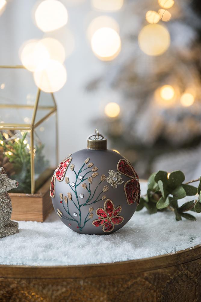 Elegant grey Christmas bauble with embroidered red floral design and gold accents