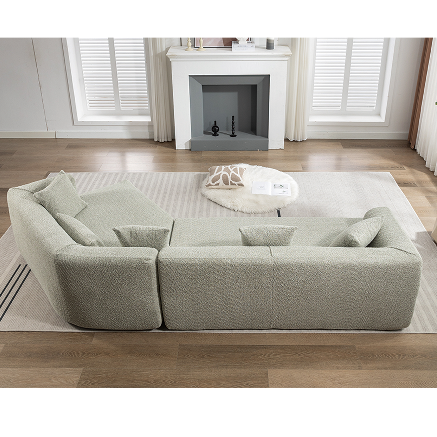 Plush boucle sectional sofa in light grey with deep seating and plush throw pillows