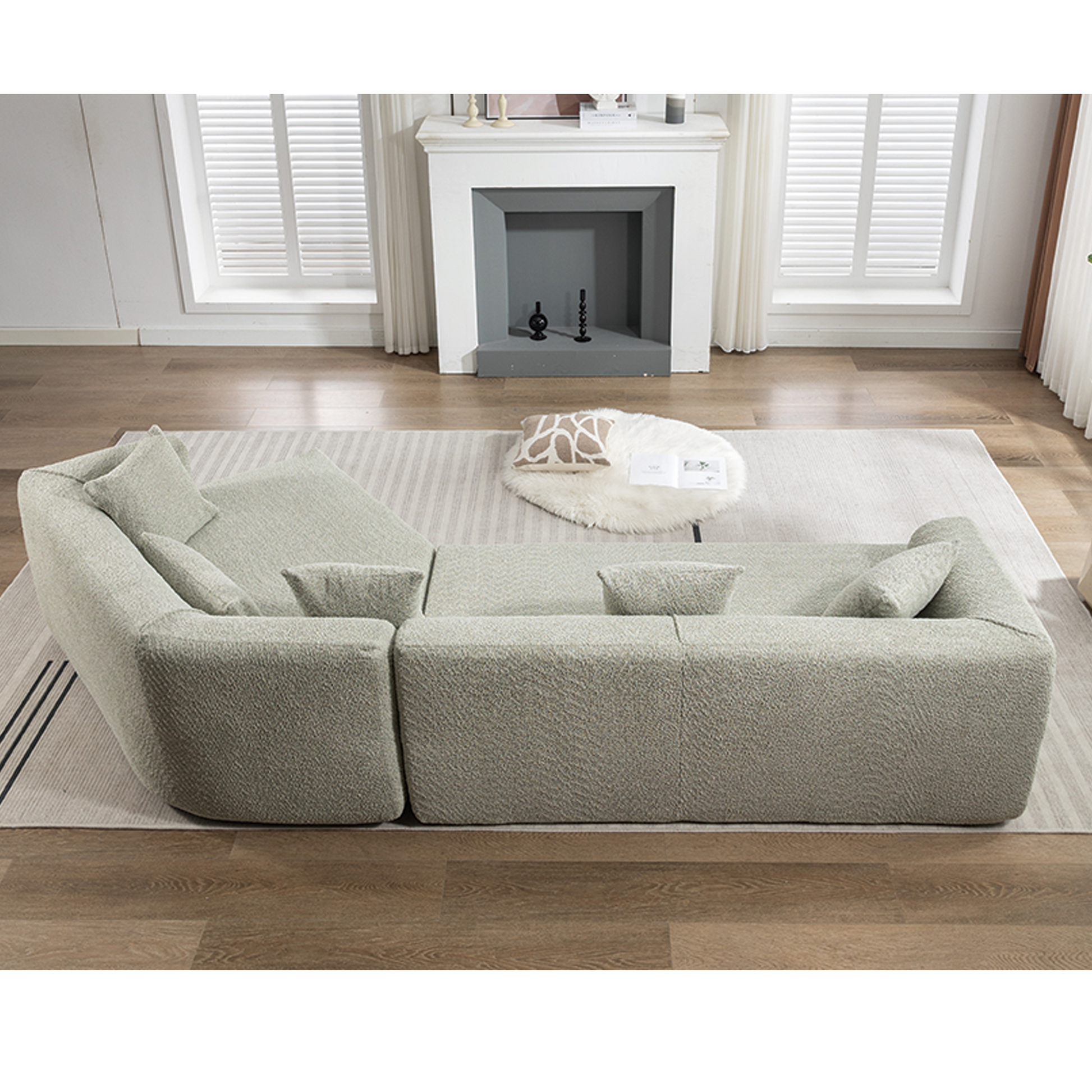 Plush boucle sectional sofa in light grey with deep seating and plush throw pillows