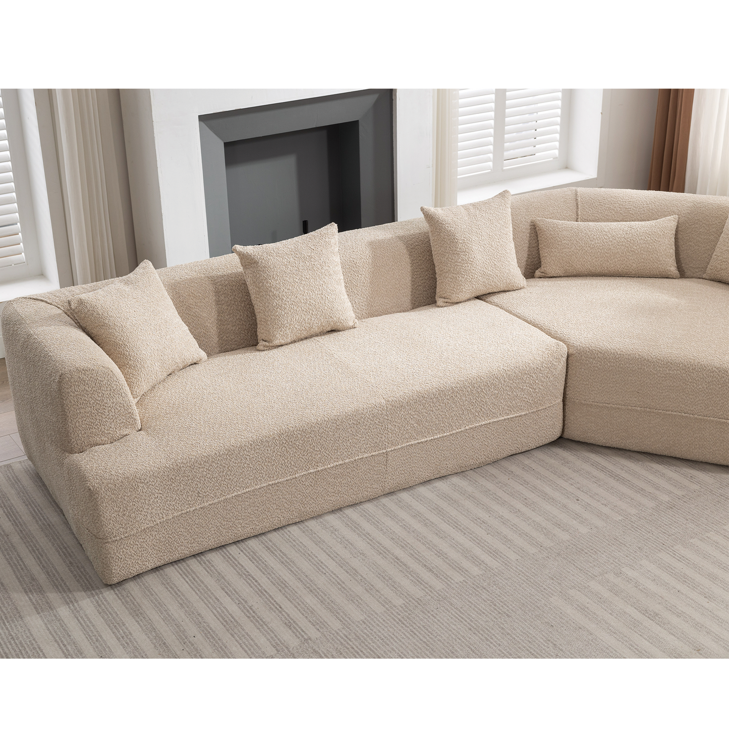 Plush beige sectional sofa with textured upholstery and matching throw pillows