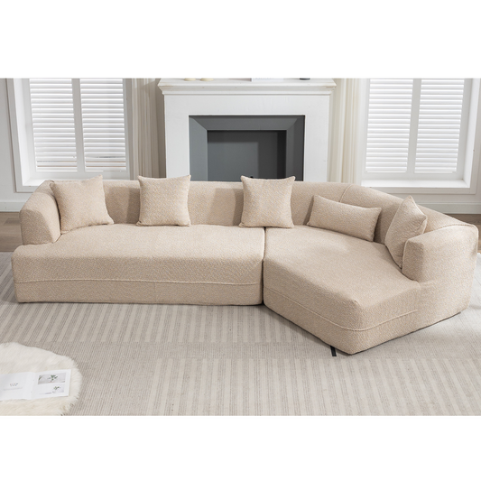 Plush beige sectional sofa with textured fabric and matching throw pillows perfect for modern living rooms