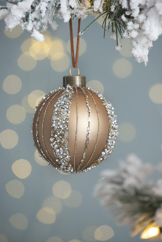 Champagne bauble ornament with vertical stripe detailing and scattered clear crystals