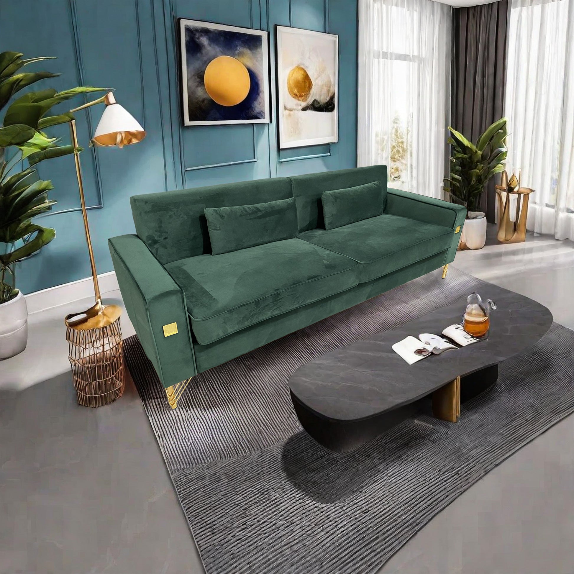 Plush emerald green velvet sofa with gold legs and modern design perfect for living rooms