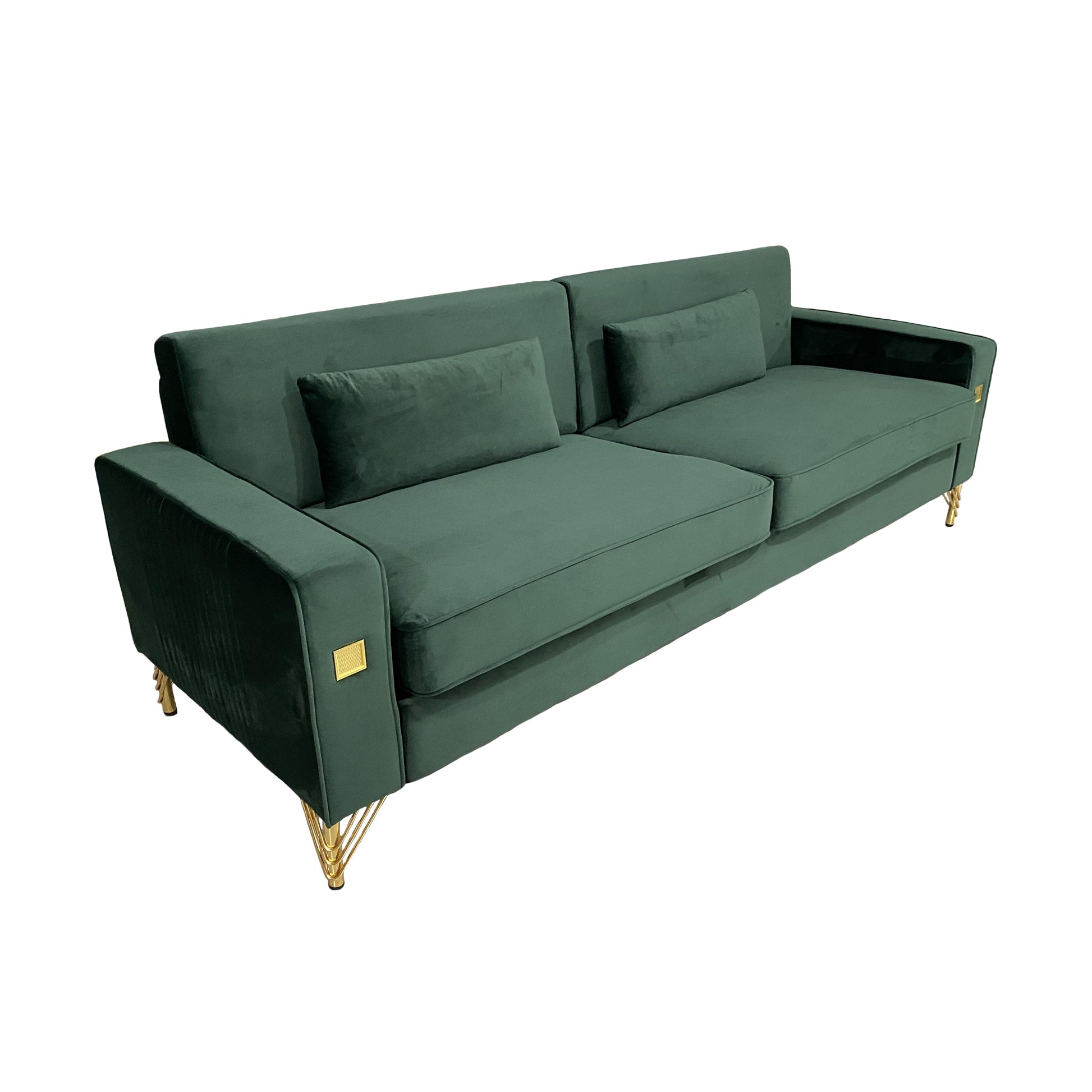 Deep green velvet sofa with plush cushions and gold accent legs modern design