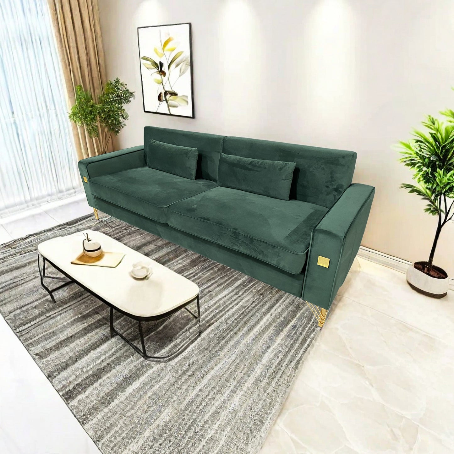 Plush emerald green velvet sofa with gold accents and matching cushions