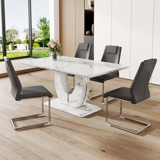 Rectangular white marble dining table with a sculpted pedestal base paired with four charcoal faux leather chairs