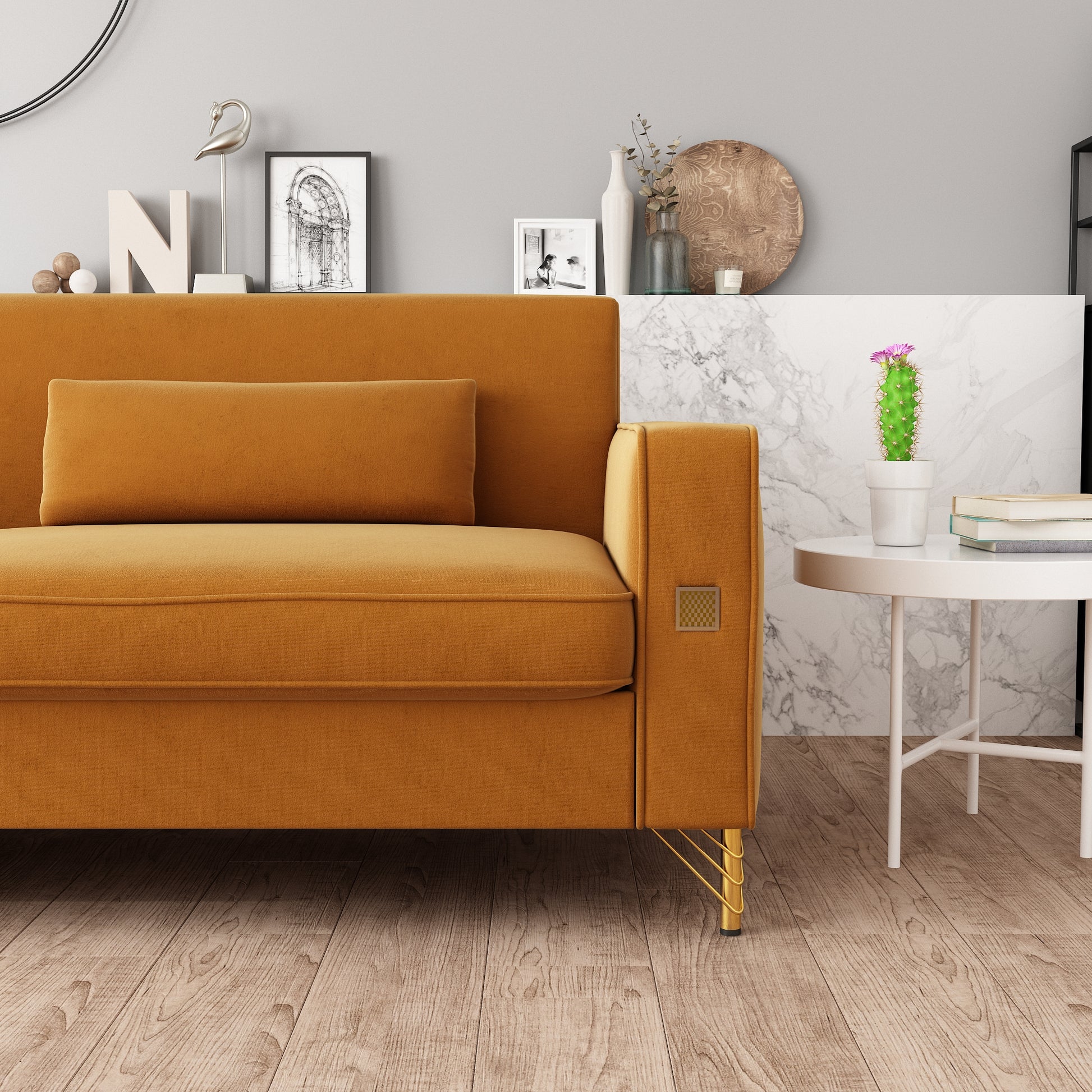Contemporary burnt orange velvet sofa with minimalist gold legs perfect for a modern living room