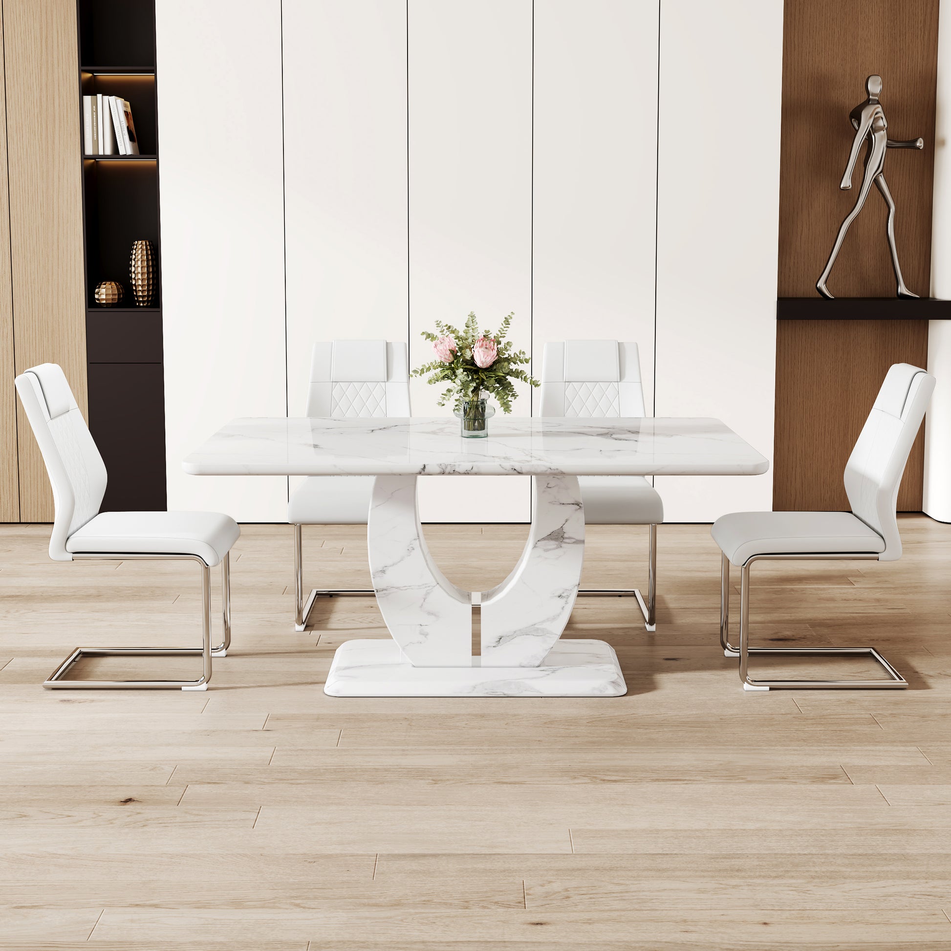 Modern white marble dining table with a unique pedestal base and four upholstered chairs