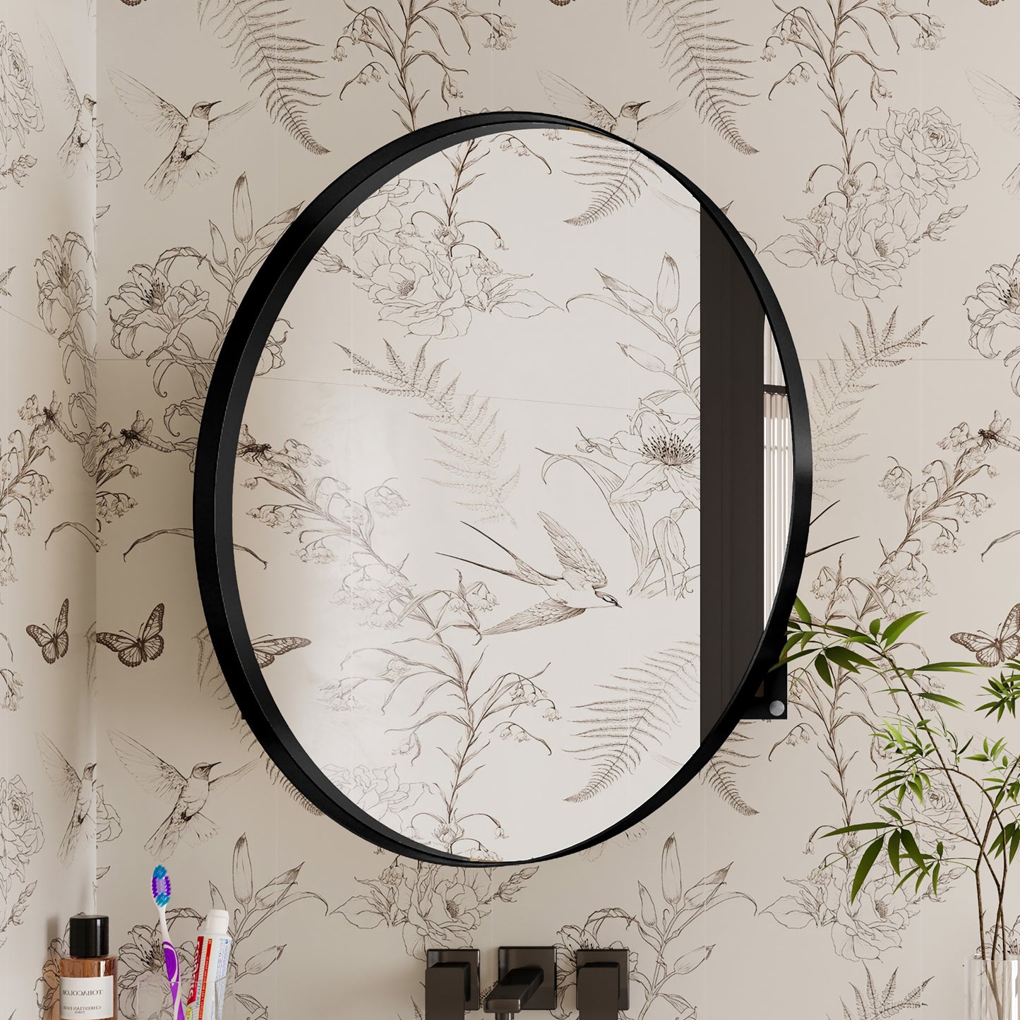 Round black metal framed mirror with botanical sketch wallpaper