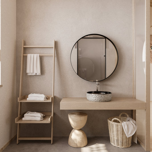 Wooden bathroom vanity with a textured stone sink and sleek chrome faucet