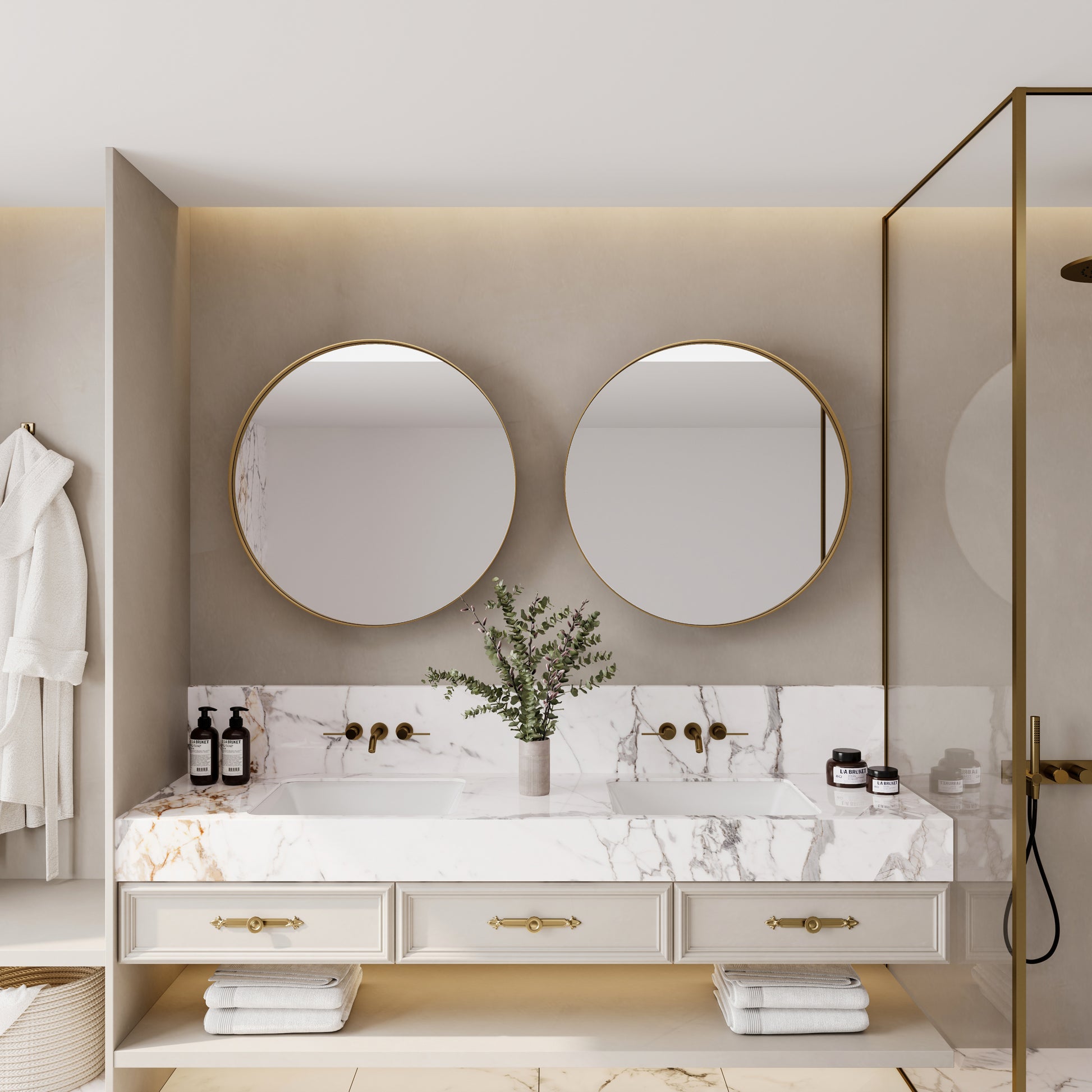 Modern double vanity with marble countertop and goldframed mirrors