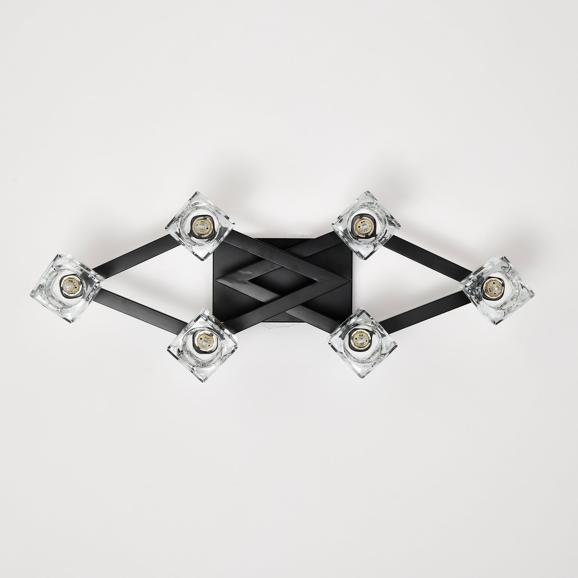 Modern black fixture with crystal cube lights creating ambient ceiling lighting