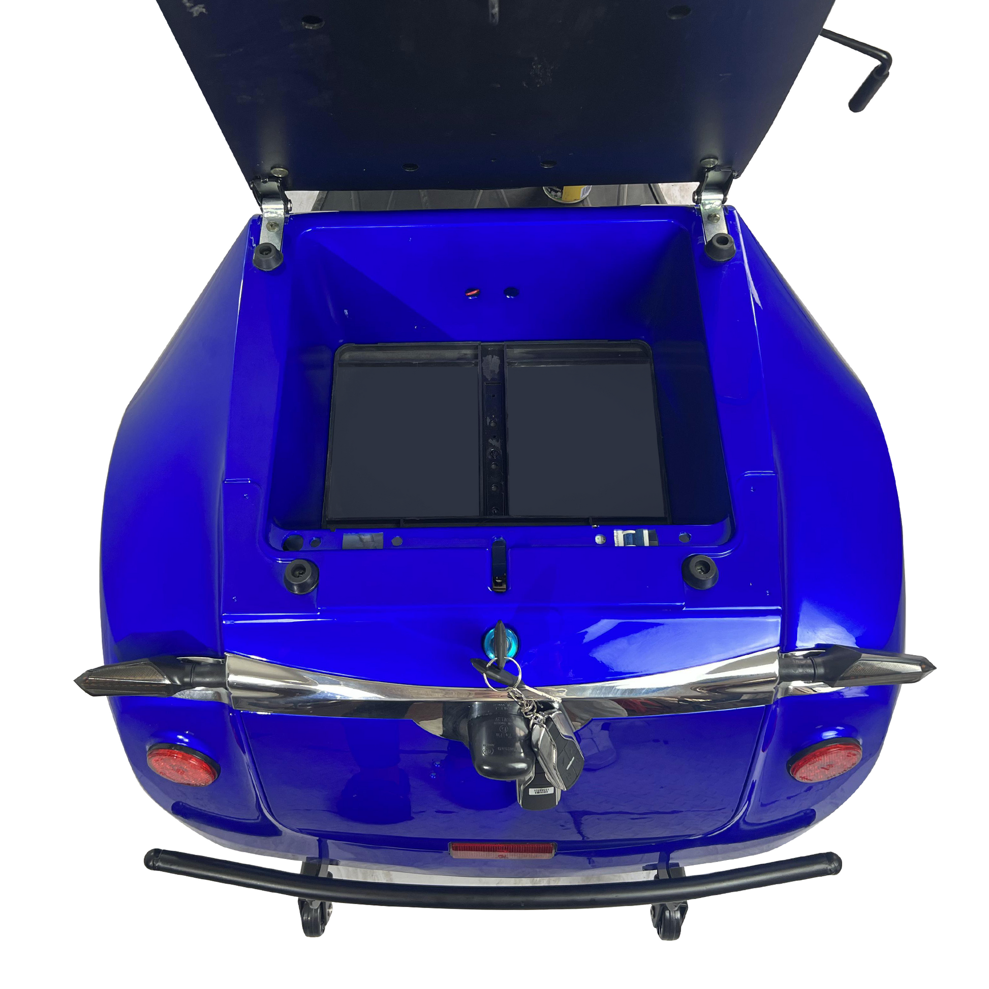 Open blue scooter trunk with storage compartments visible featuring chrome accents and keys