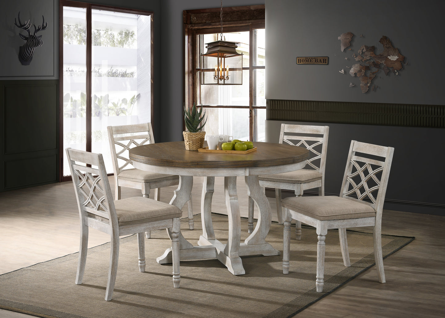 Distressed white wood dining chairs with upholstered seats arranged around round wood table