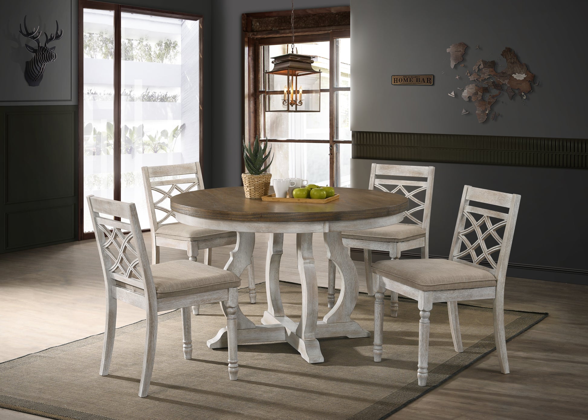 Distressed white wood dining chairs with upholstered seats arranged around round wood table