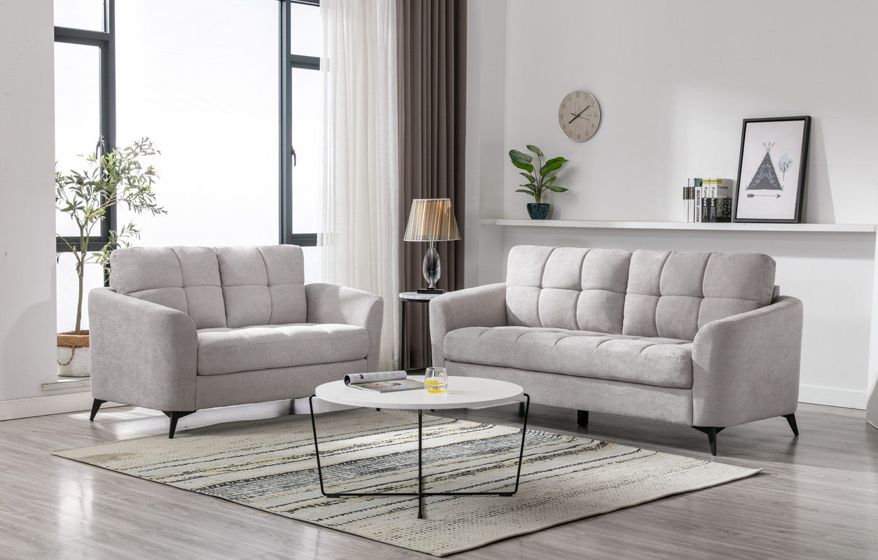Light grey fabric loveseat with tufted back cushions on black legs