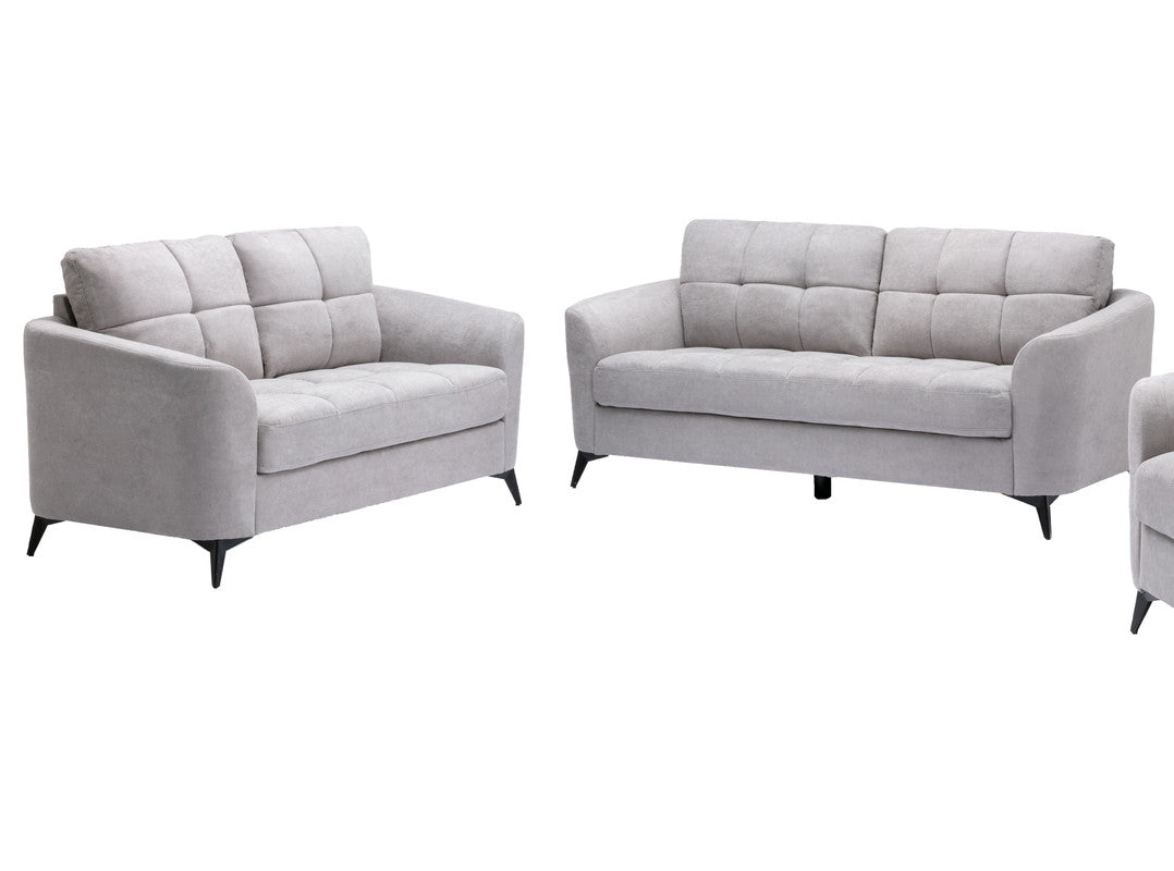Light grey fabric seater sofa with tufted cushions and black tapered legs