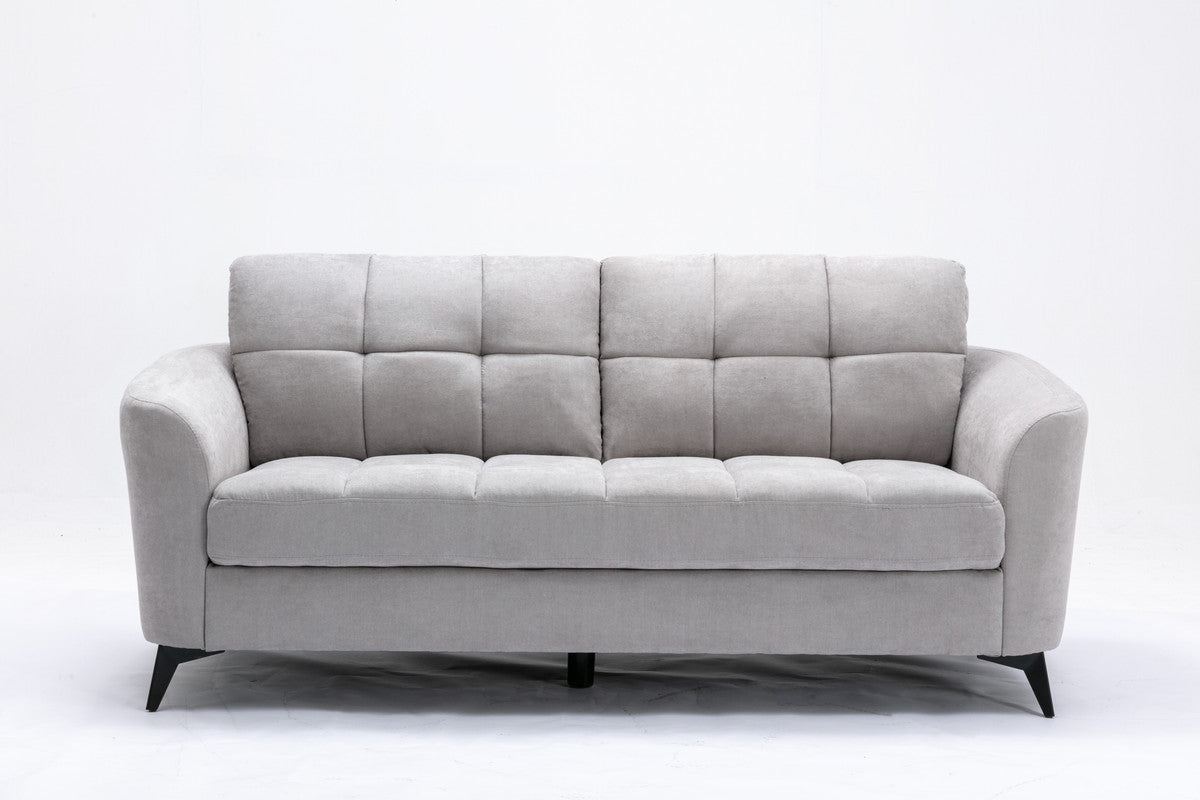 Tufted grey fabric sofa with modern black legs perfect for a living room