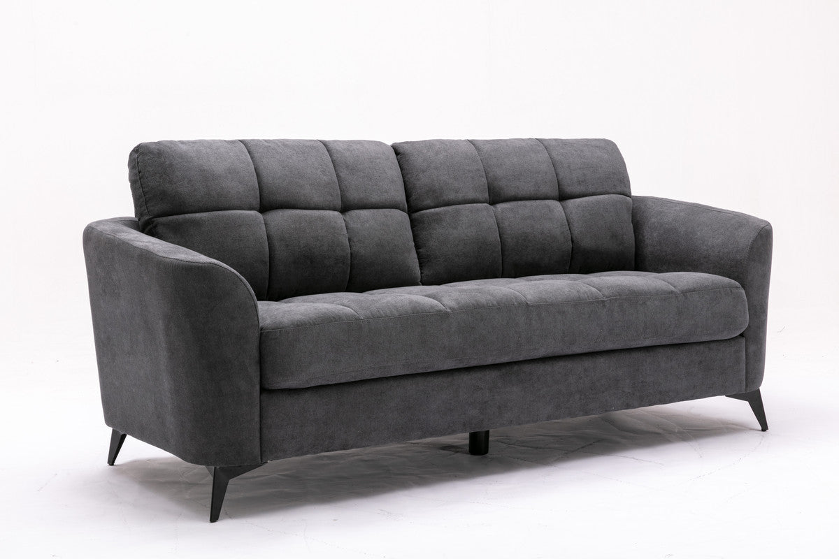Dark gray tufted fabric sofa with plush cushions and tapered legs perfect for modern living rooms