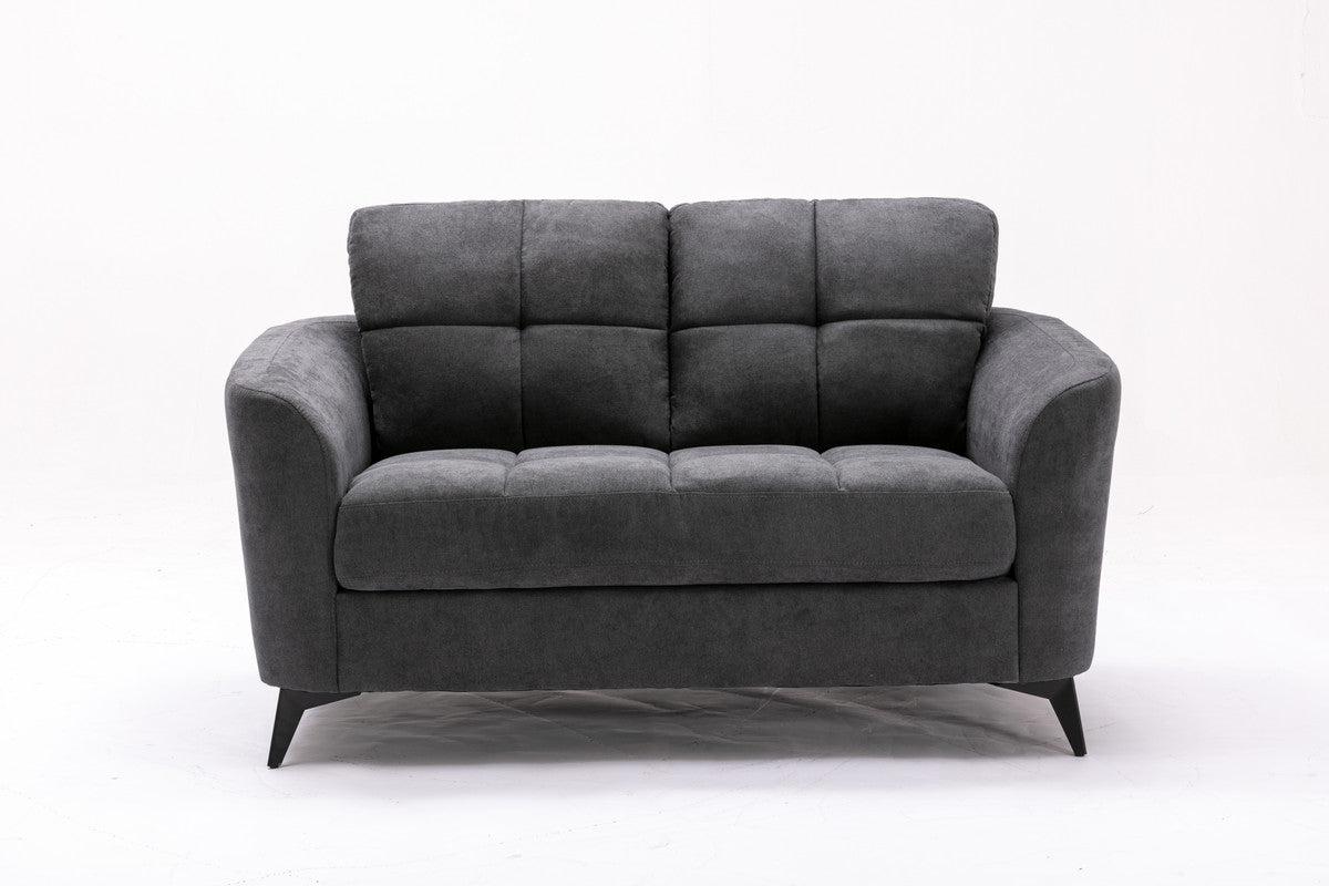 Dark grey fabric loveseat with tufted cushions and modern black legs