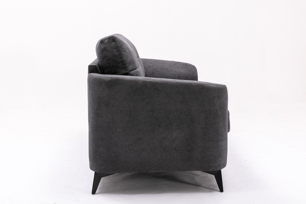 Dark gray fabric couch with plush cushions and tapered black legs