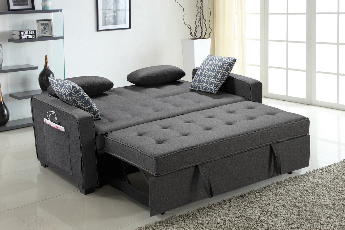 Dark gray fabric sofa bed with tufted cushions and builtin storage pockets