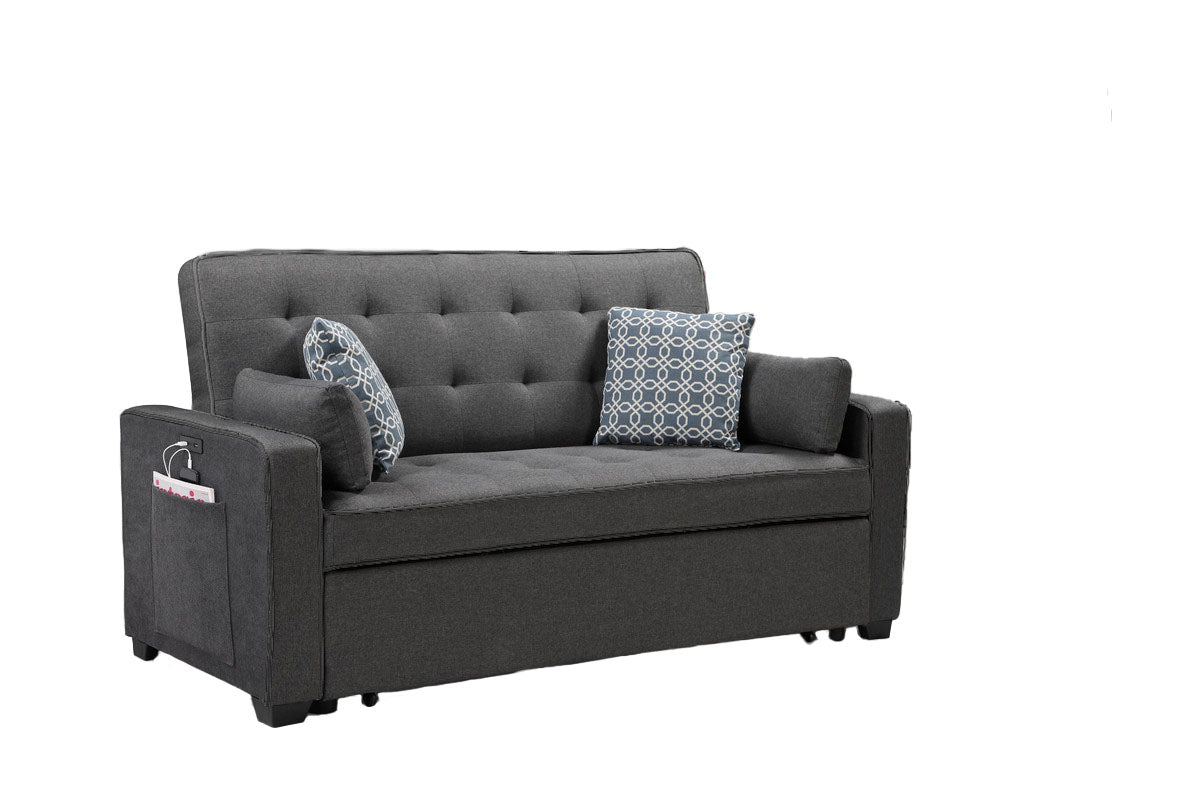 Dark gray fabric futon sofa with tufted back and decorative pillows ideal for small spaces