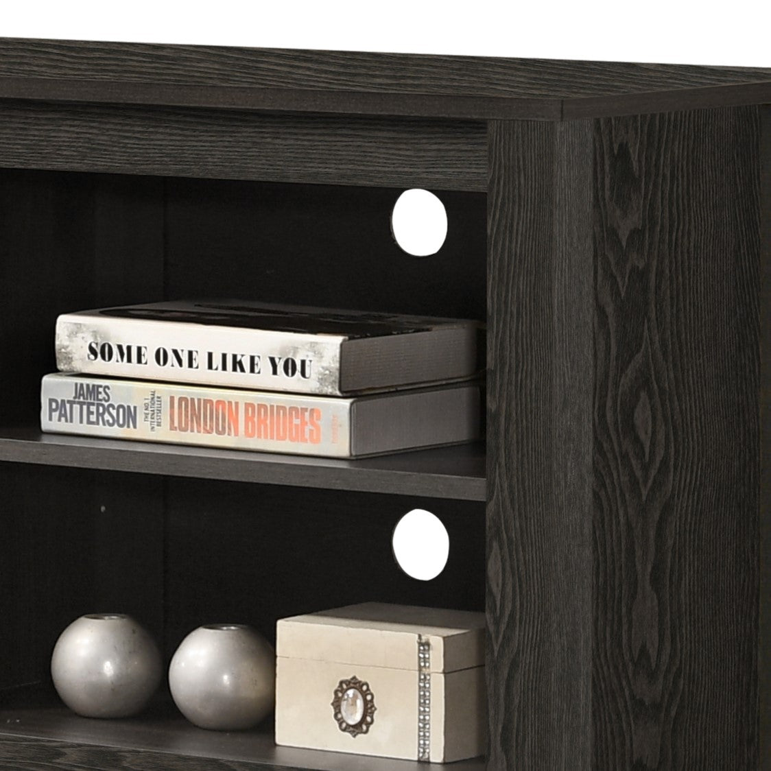 Dark oak media console shelf with two books Some One Like You and London Bridges
