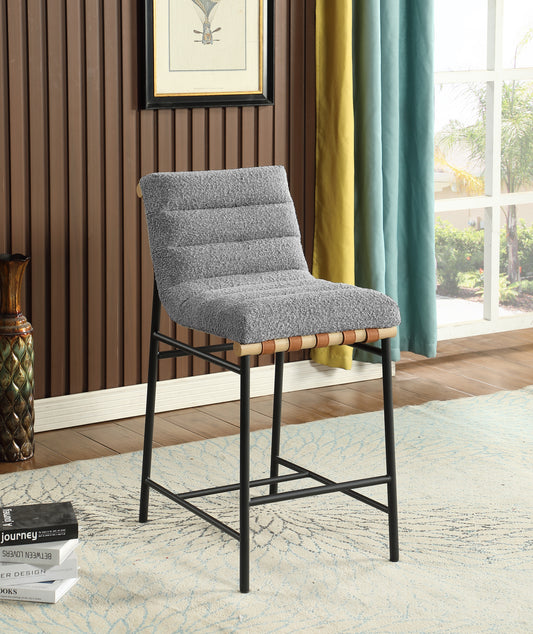 Modern grey textured fabric counter stool with leather straps and black metal legs