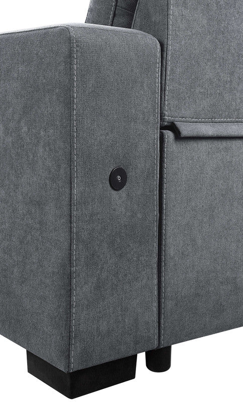 Closeup of a gray fabric recliner armrest with a black control button