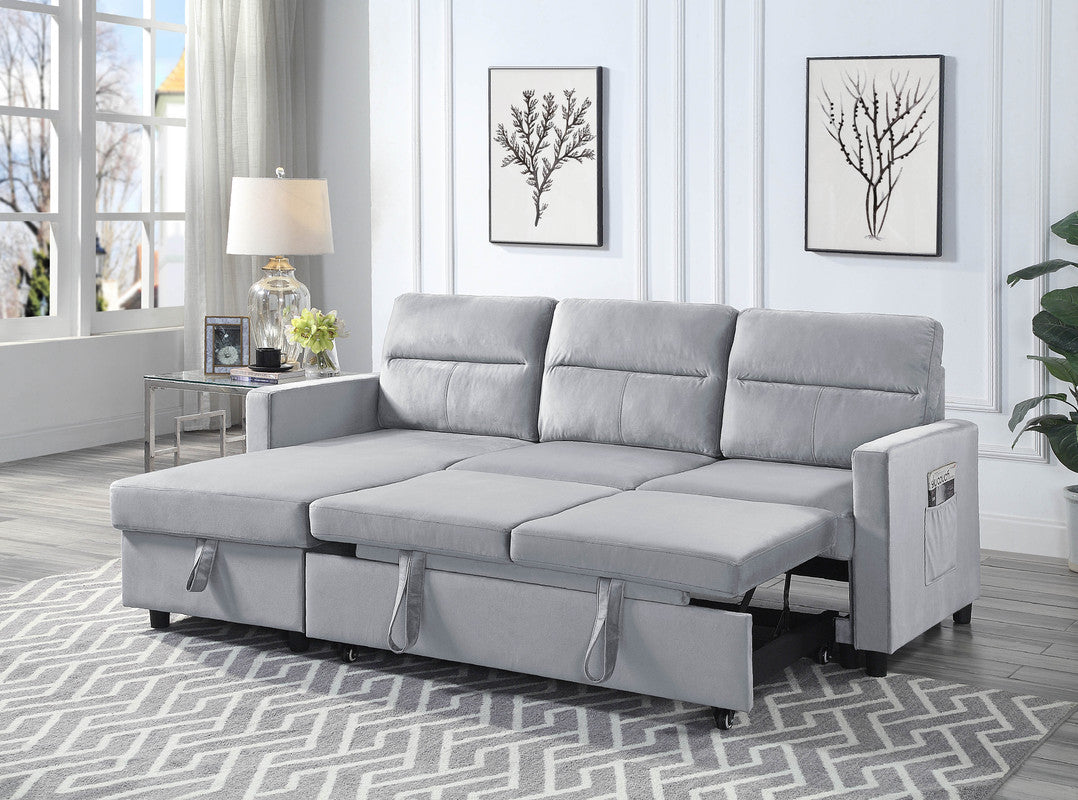 Grey sectional sofa with pullout bed functionality and integrated storage compartments