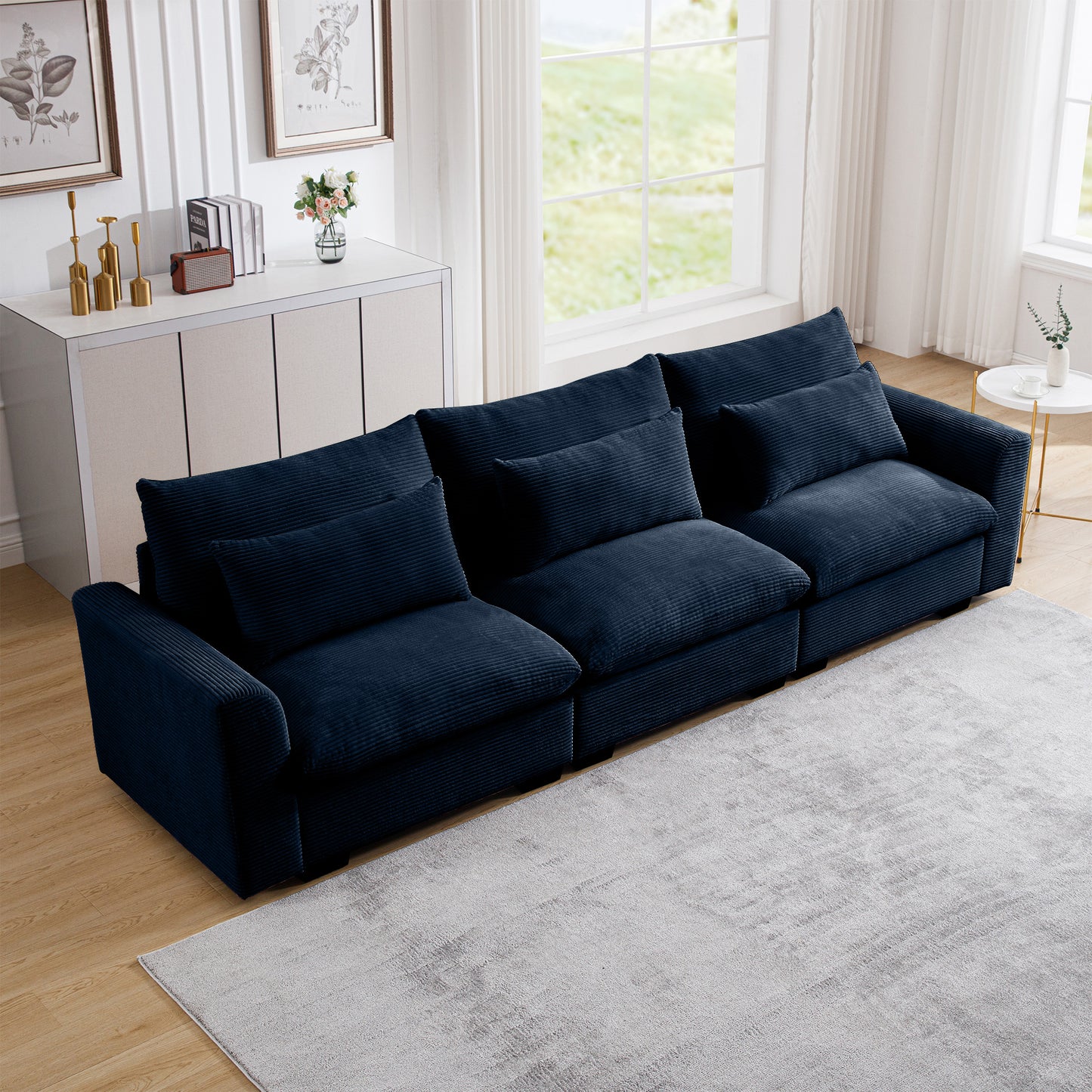 Navy blue corduroy sectional sofa with plush cushions for a comfortable living room