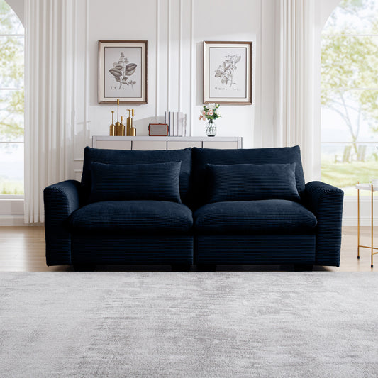 Navy corduroy sofa with plush cushions perfect for modern living rooms