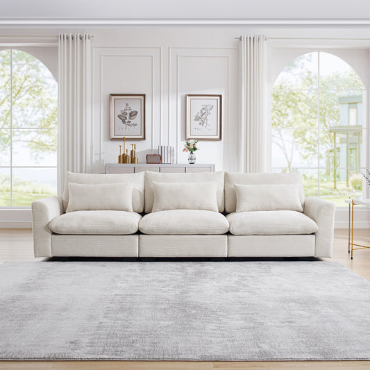 Cream corduroy sofa with plush cushions perfect for a modern living room arrangement
