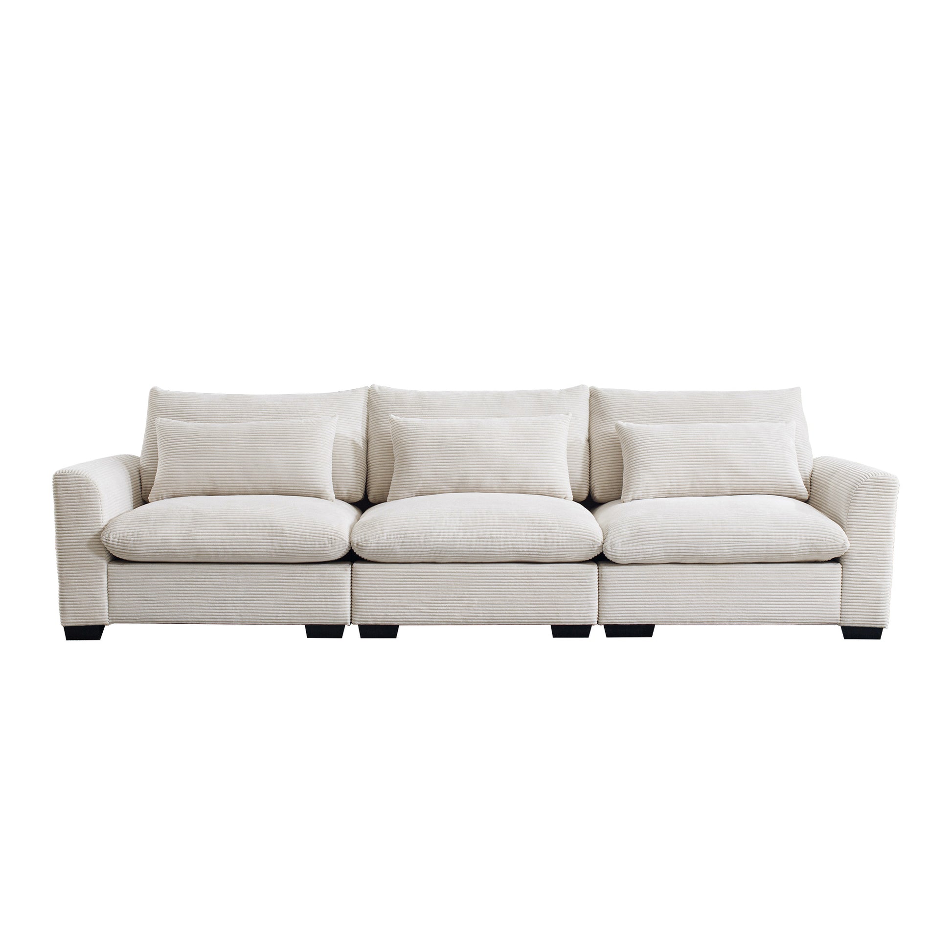 Cream corduroy modular sectional sofa with plush seat cushions and throw pillows