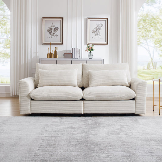 Cream corduroy sofa with plush cushions and modern design perfect for living rooms