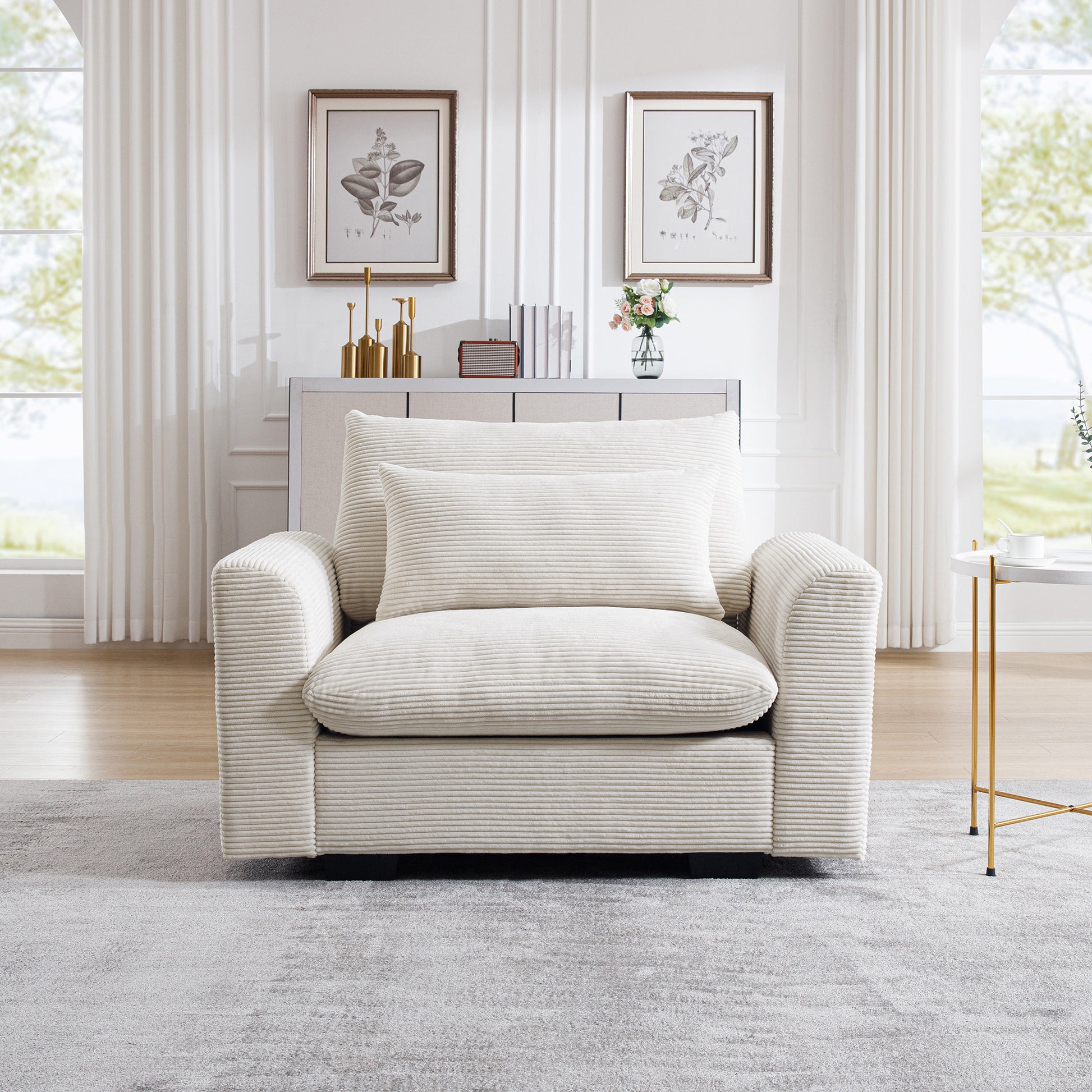 Plush corduroy armchair in cream featuring a comfortable oversized seat and backrest for ultimate relaxation
