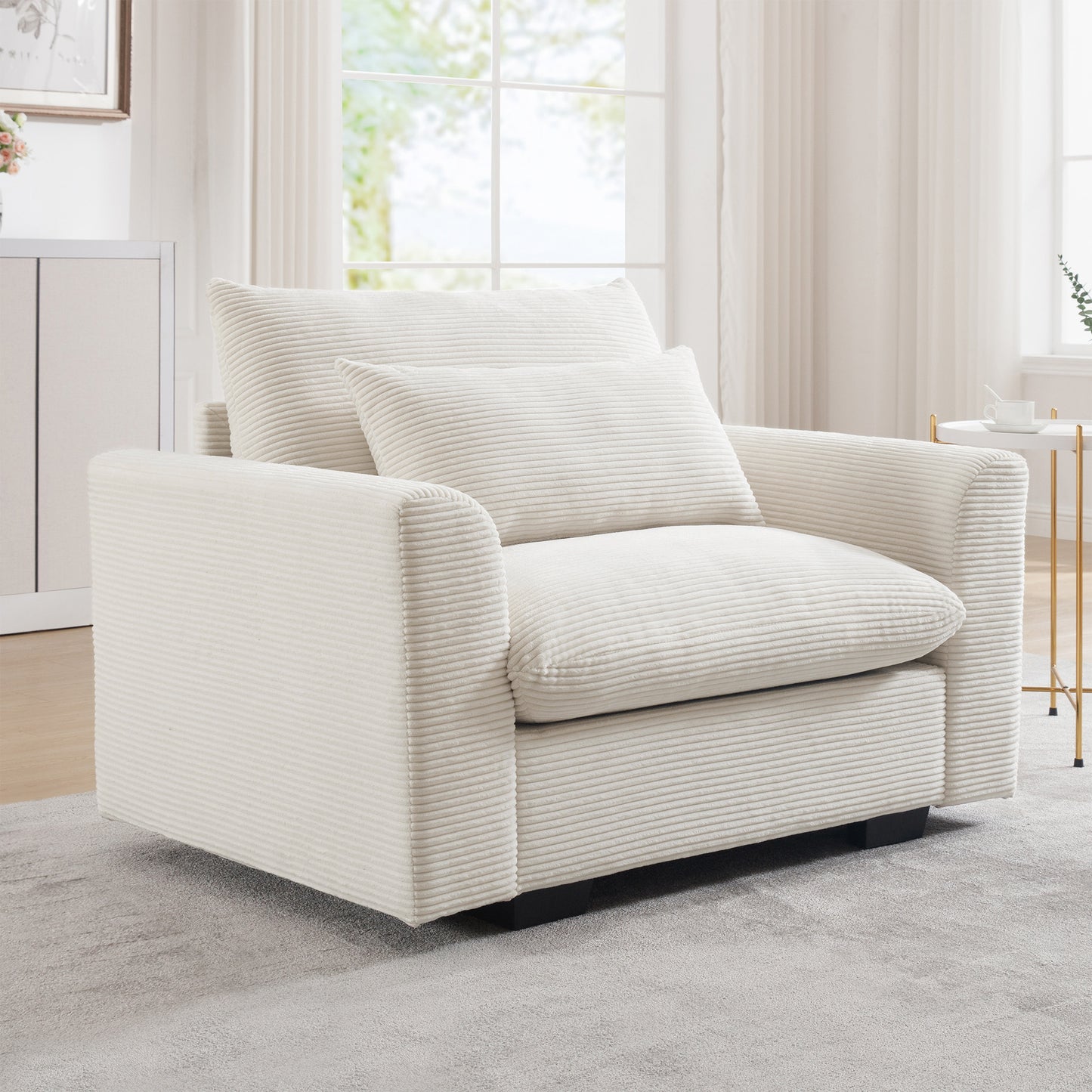 Cream corduroy accent chair with plush cushions and wide arms for comfort