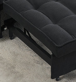Black corduroy futon sofa bed with tufted cushions and metal frame