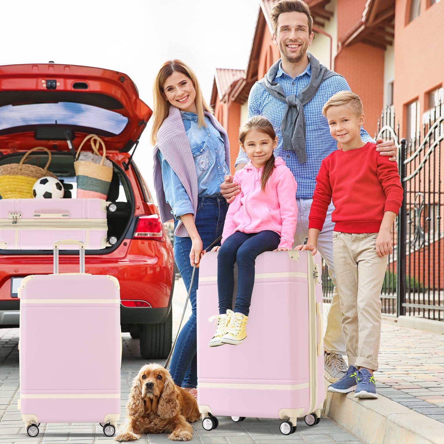 Light pink hardshell suitcase with cream trim perfect for family travel