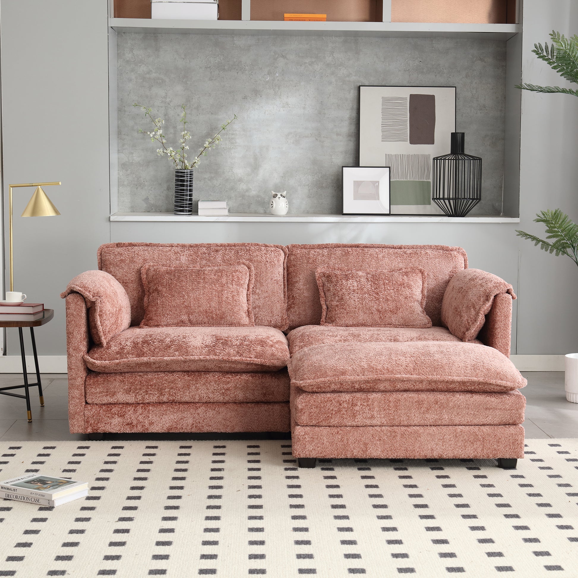 Plush rose pink sectional sofa with soft textured fabric and matching throw pillows