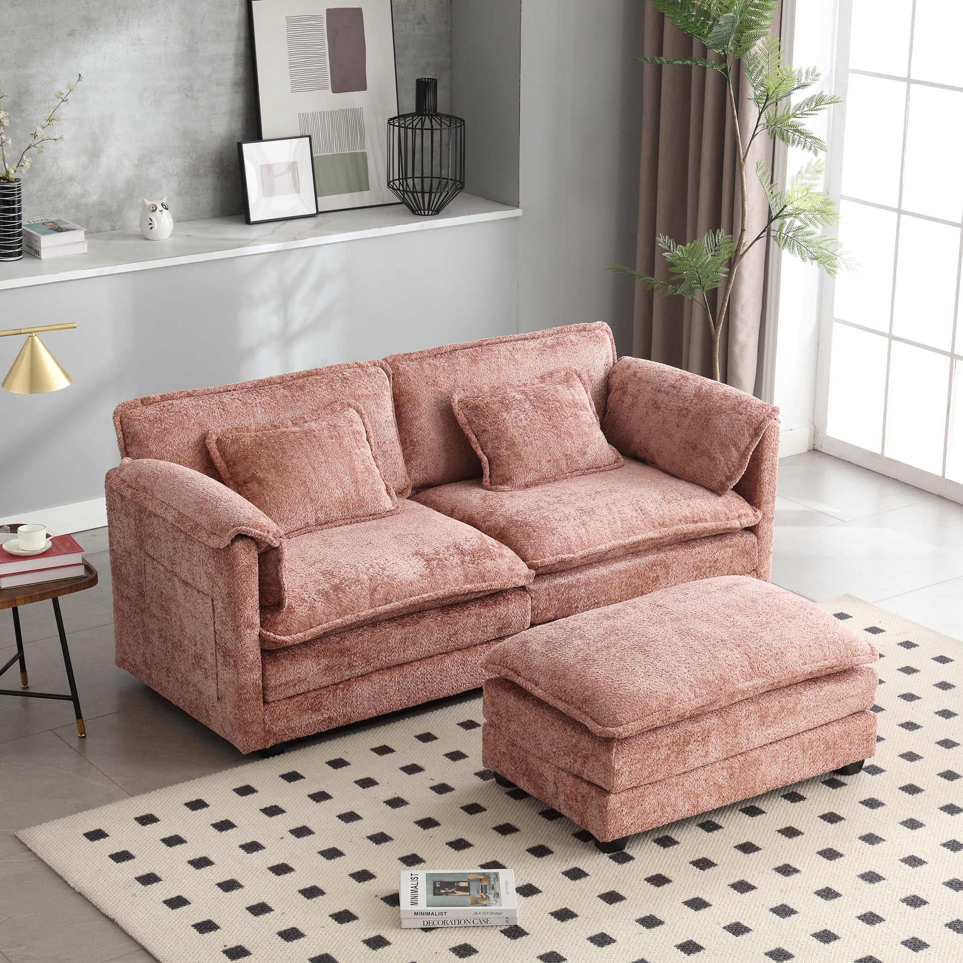Dusty rose plush sofa with matching ottoman ideal for a cozy living room