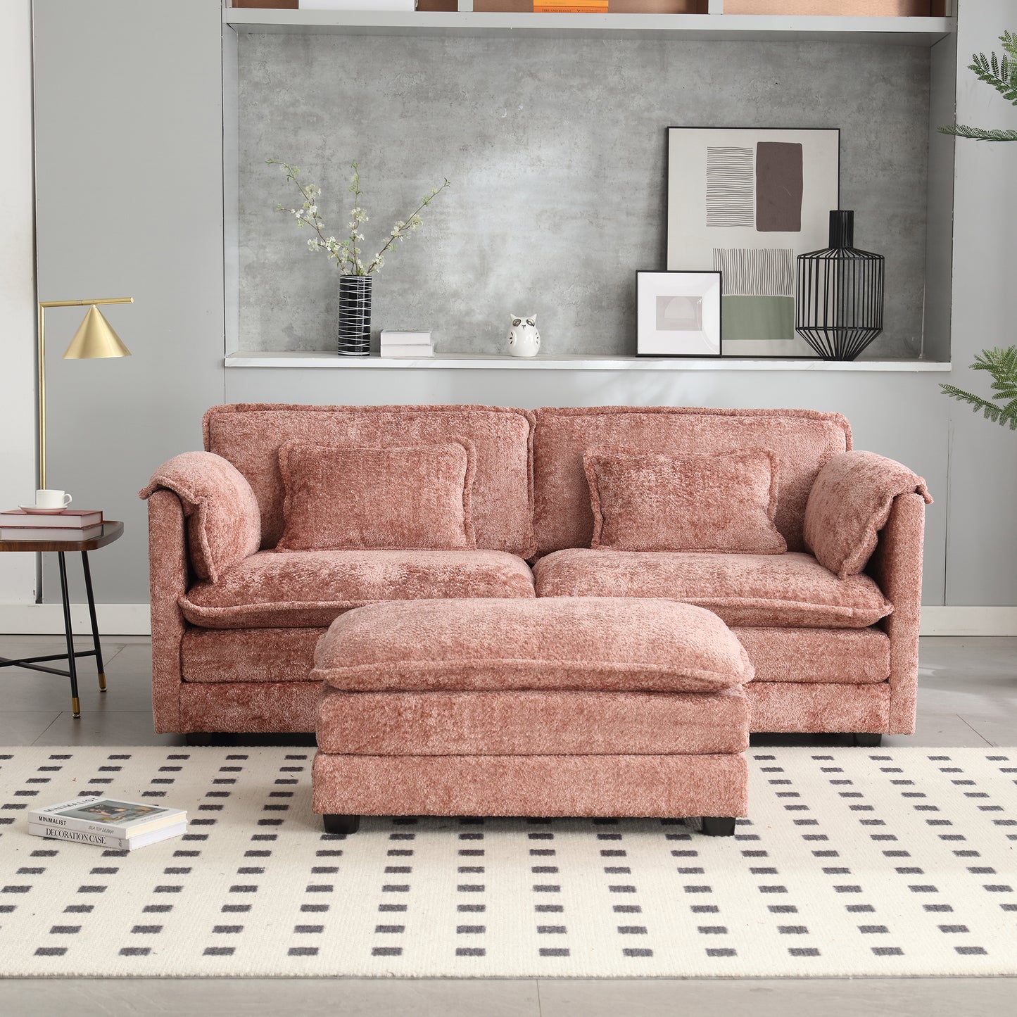 Plush rose pink fabric sofa with matching ottoman featuring deep seat cushions