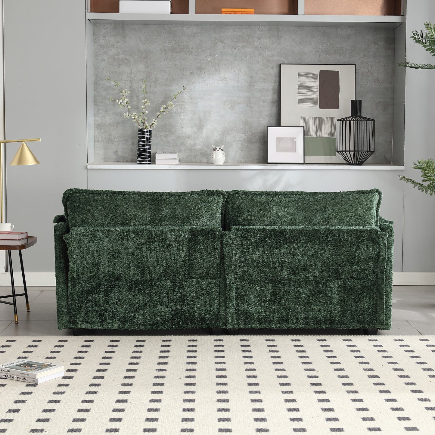 A plush forest green velvet sofa with deep seat cushions perfect for a modern living room